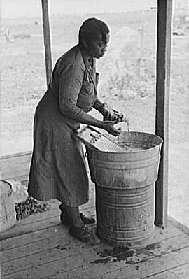 1938 photo of washing clothes by hand