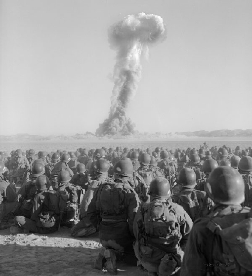 U.S. Army soldiers watching a 1951 atomic explosion at Yucca Flats