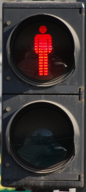 Photograph of a Traffic Light Showing Pedestrian Crossing Is Prohibited With a Red Man Light